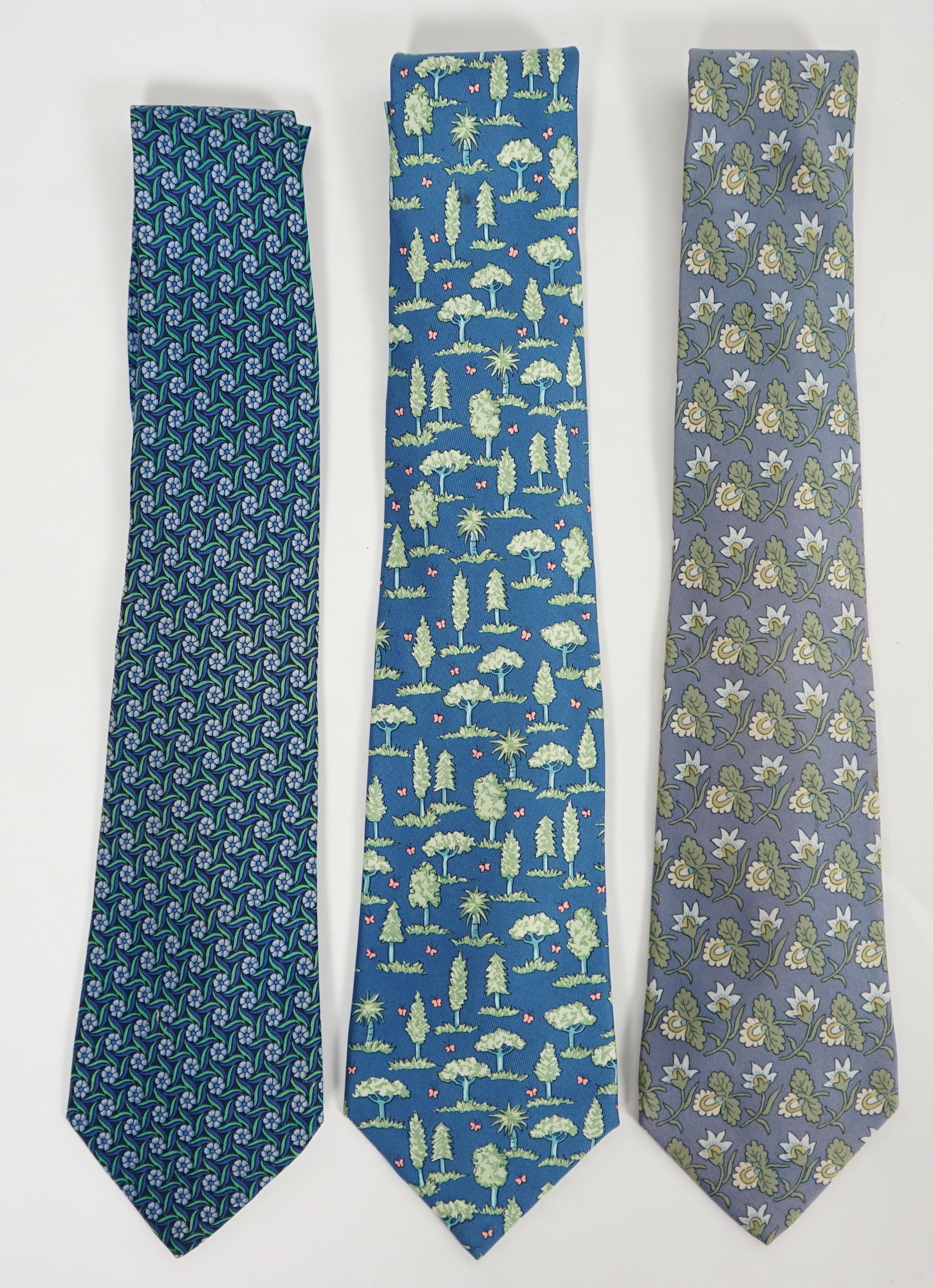 Three Hermès gentlemen's assorted patterned silk ties